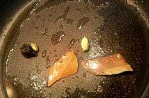 tempering-whole-spices-for-indian-chicken-curry